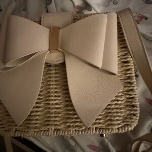 Elegant Cream Woven Bag with Bow Accent